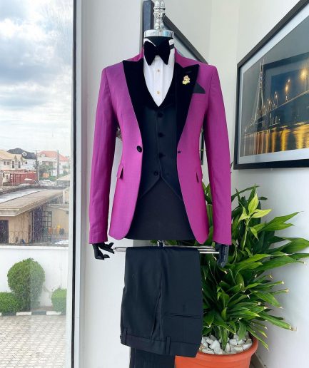 A Magenta, one button, peak lapel tuxedo jacquard suit.