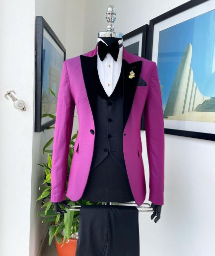A Magenta, one button, peak lapel tuxedo jacquard suit.