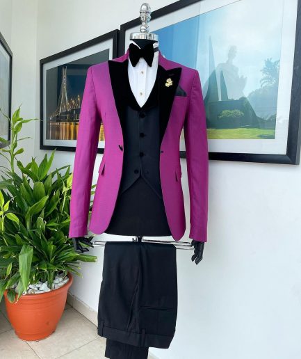 A Magenta, one button, peak lapel tuxedo jacquard suit.