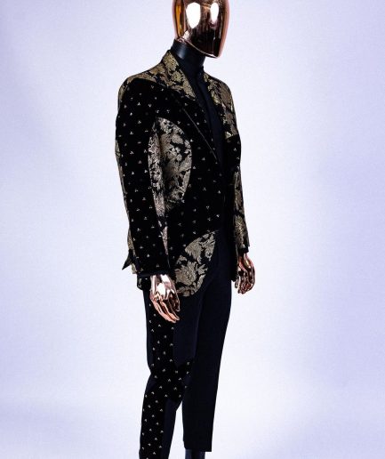 A “Prodigal” dispersed Black and splashed champagne gold suit, Layered black velvet with ss20 mixed Swarovski