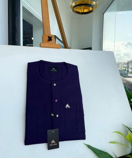 An egg plant purple, front flap and double layer patch pocket detailing senator kaftan native.