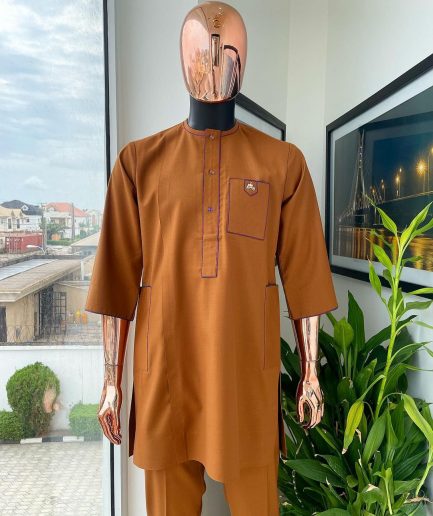 A Tawny brown, front flap, patch pocket, matching Swarovski buttons, paisley detailing African senator kaftan native.