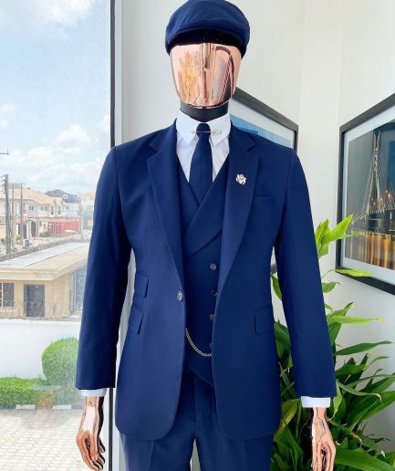 A layered square patterned navy blue “peaky blinders” - Jorgecarli super 140’s- “Board Room” suit