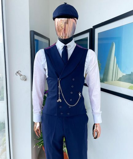 A “peaky blinders” navy blue, tiny square patterned - Jorgecarli super 140’s- “Board Room” suit