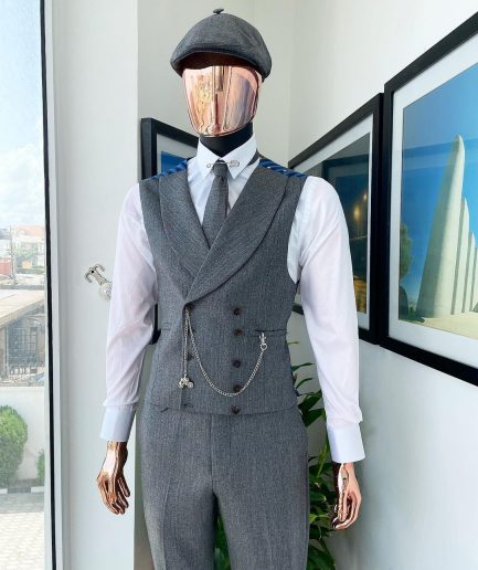 A “peaky blinders” Lava Grey, herringbone-patterned fabric, Jorgecarli Super 140's “Board Room” notch lapel suit
