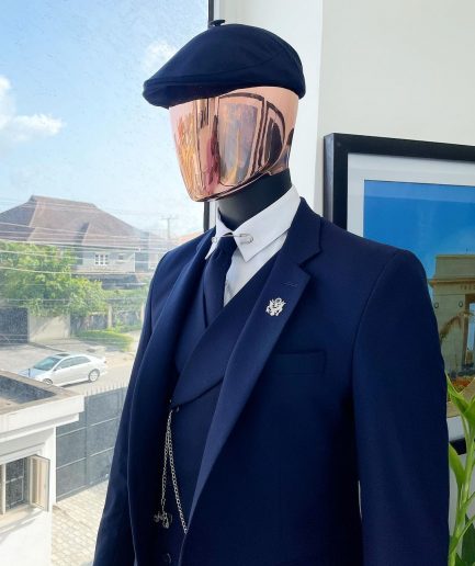 A “peaky blinders” navy blue, tiny square patterned - Jorgecarli super 140’s- “Board Room” suit