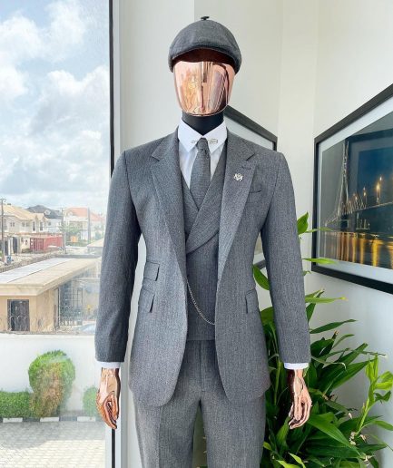 A “peaky blinders” Lava Grey, herringbone-patterned fabric, Jorgecarli Super 140's “Board Room” notch lapel suit