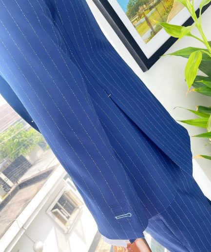 An Admiral and Skye blue pinstripe “peaky blinders” Jorgecarli Super 140's “Board Room” notch lapel suit