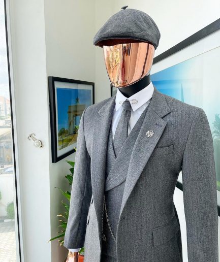 A “peaky blinders” Lava Grey, herringbone-patterned fabric, Jorgecarli Super 140's “Board Room” notch lapel suit