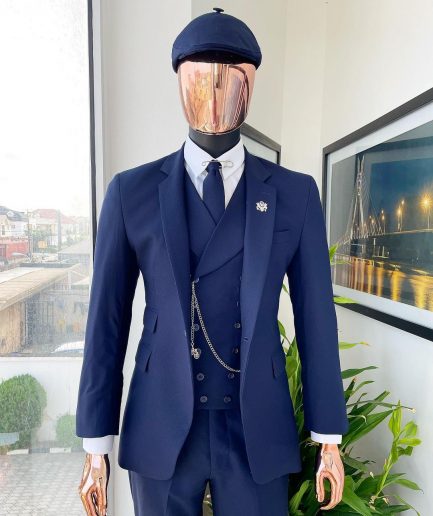 A “peaky blinders” navy blue, tiny square patterned - Jorgecarli super 140’s- “Board Room” suit