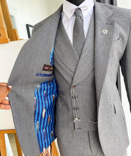 A Lava Grey, herringbone-patterned fabric Jorgecarli Super 140's “Board Room” notch lapel suit