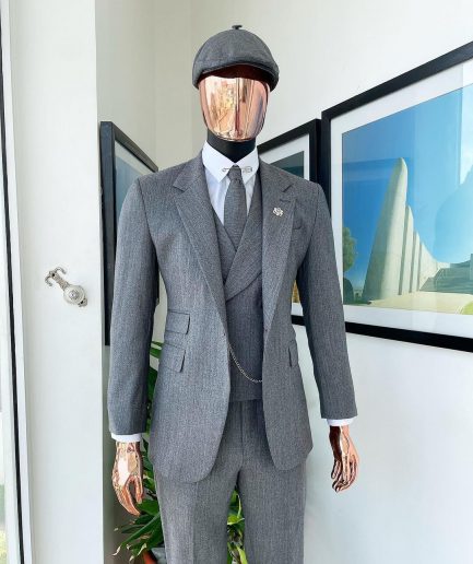 A “peaky blinders” Lava Grey, herringbone-patterned fabric, Jorgecarli Super 140's “Board Room” notch lapel suit