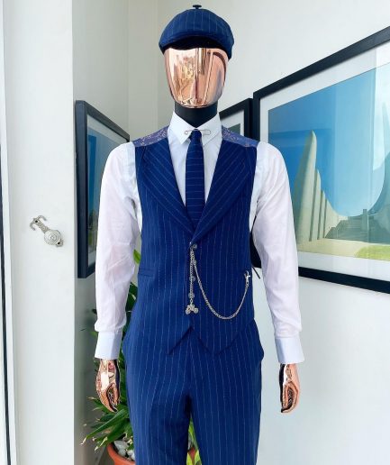 An Admiral and Skye blue pinstripe “peaky blinders” Jorgecarli Super 140's “Board Room” notch lapel suit