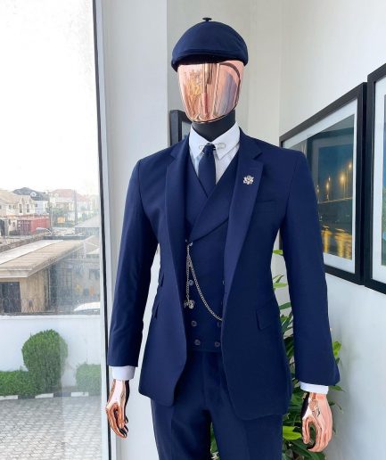 A “peaky blinders” navy blue, tiny square patterned - Jorgecarli super 140’s- “Board Room” suit
