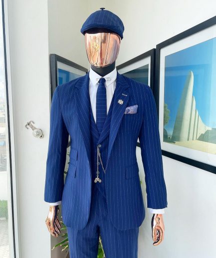 An Admiral and Skye blue pinstripe “peaky blinders” Jorgecarli Super 140's “Board Room” notch lapel suit