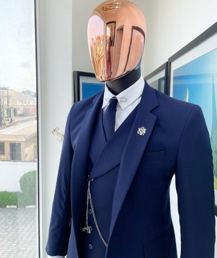 A Navy blue, tiny square-patterned Jorgecarli Super 140's “Board Room” notch lapel suit