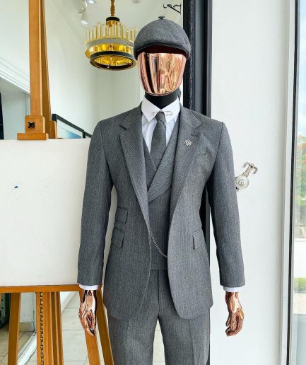 A “peaky blinders” Lava Grey, herringbone-patterned fabric, Jorgecarli Super 140's “Board Room” notch lapel suit