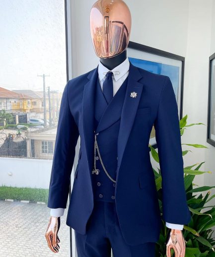 A Navy blue, tiny square-patterned Jorgecarli Super 140's “Board Room” notch lapel suit