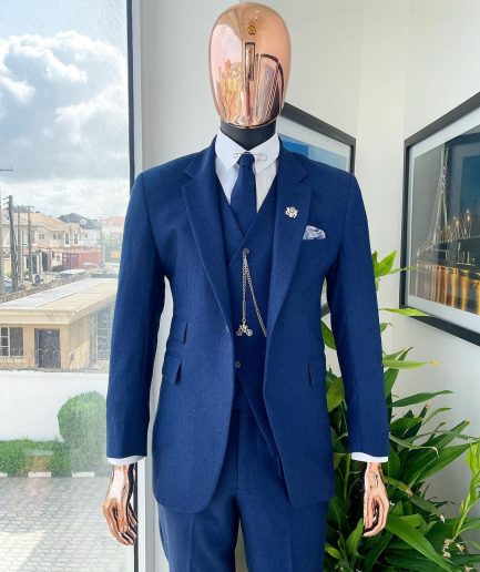 A navy blue Jorgecarli Super 140's “Board Room” notch lapel suit