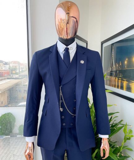 A Navy blue, tiny square-patterned Jorgecarli Super 140's “Board Room” notch lapel suit