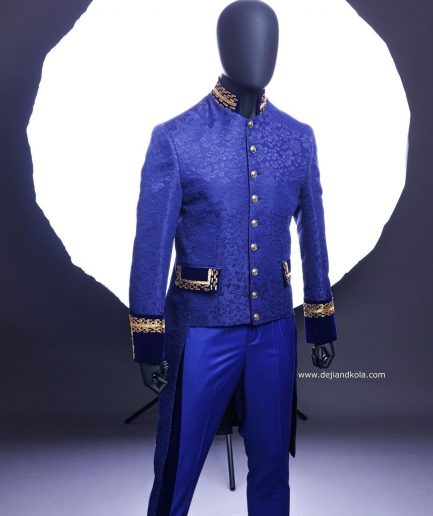 A Navy blue “Prince of Persia” ceremonial tail suit, Gold Metal Wire hand woven embroidery detail mix on velvet