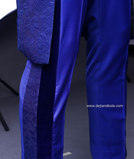 A Navy blue “Prince of Persia” ceremonial tail suit, Gold Metal Wire hand woven embroidery detail mix on velvet