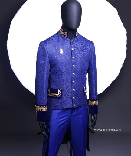 A Navy blue “Prince of Persia” ceremonial tail suit, Gold Metal Wire hand woven embroidery detail mix on velvet