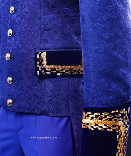 A Navy blue “Prince of Persia” ceremonial tail suit, Gold Metal Wire hand woven embroidery detail mix on velvet