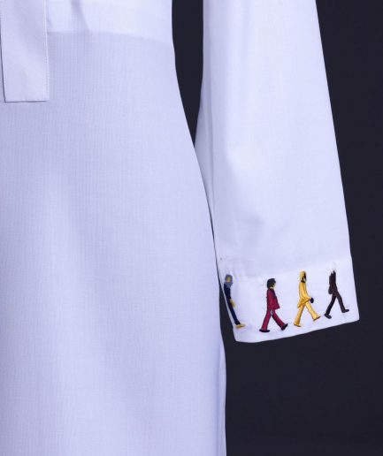 A White, front flap with mixed Swarovski buttons, patch pocket, free hand cuff with (keep walking) embroidery detailing African senator kaftan native.