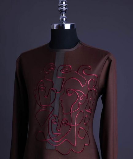 A Hickory Brown, front flap with “Eve Of May” embroidery detailing African senator kaftan native.