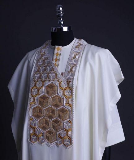 An Ivory White, Connected inverted cube -layered 3D embroidery design with splashed gold ss30 Swarovski stone details Agbada