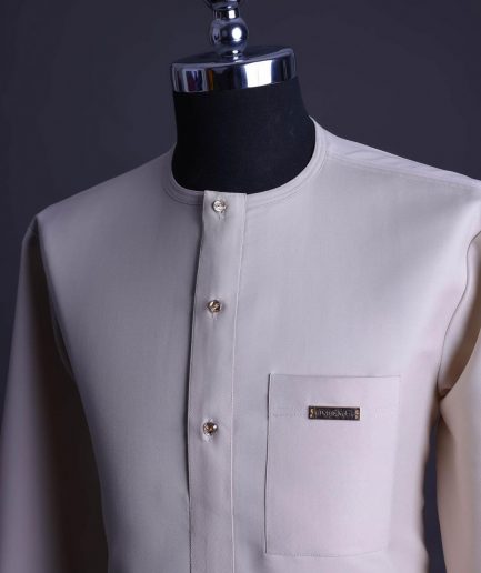 A Porcelain, front flap with gold Swarovski button, patch pocket, 3/4 sleeve African senator kaftan native.