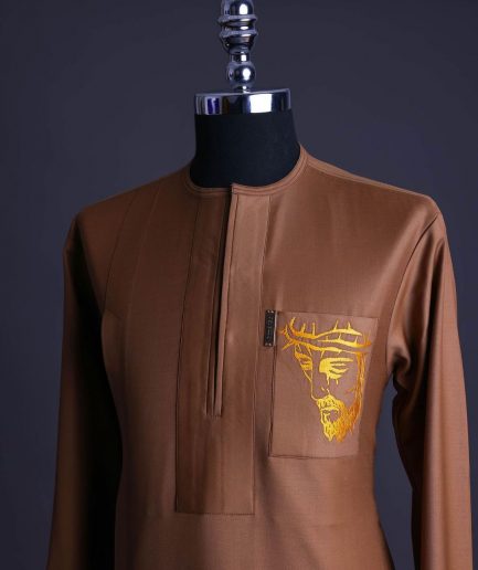 A Gingerbread brown, wide double lane flap, patch pocket with “Golgotha” embroidery detailing African senator kaftan native.
