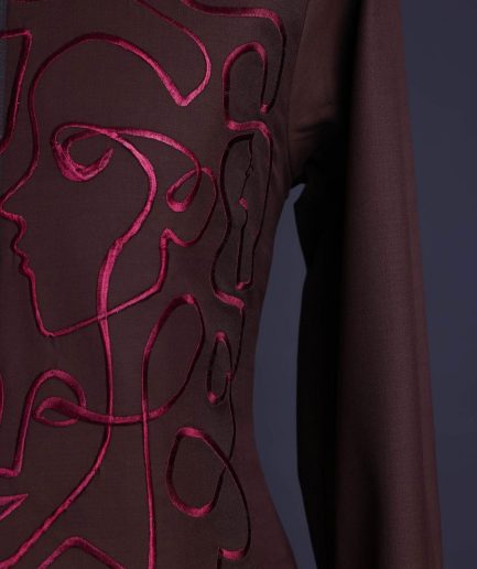 A Hickory Brown, front flap with “Eve Of May” embroidery detailing African senator kaftan native.