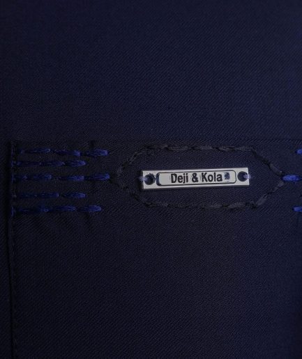 A Navy blue front flap, patch pocket with spiral embroidery detailing African senator Kaftan