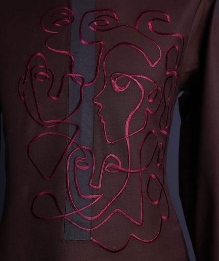 A Hickory Brown, front flap with “Eve Of May” embroidery detailing African senator kaftan native.