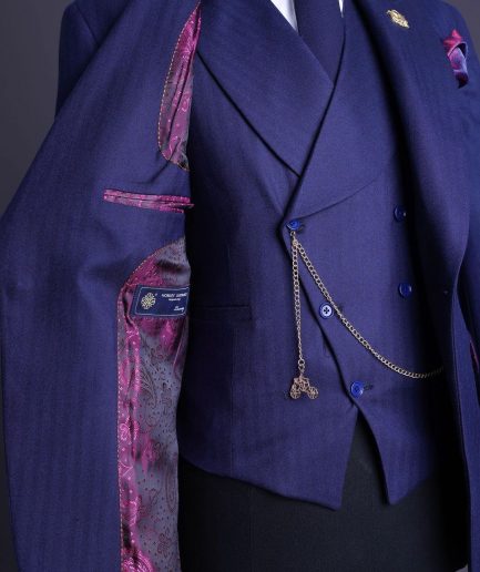 A Navy Blue, Herringbone Nobility Super “140s” “Board Room” Peak Lapel Suit