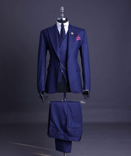 A Navy Blue, Herringbone Nobility Super “140s” “Board Room” Peak Lapel Suit