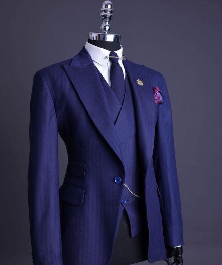 A Navy Blue, Herringbone Nobility Super “140s” “Board Room” Peak Lapel Suit