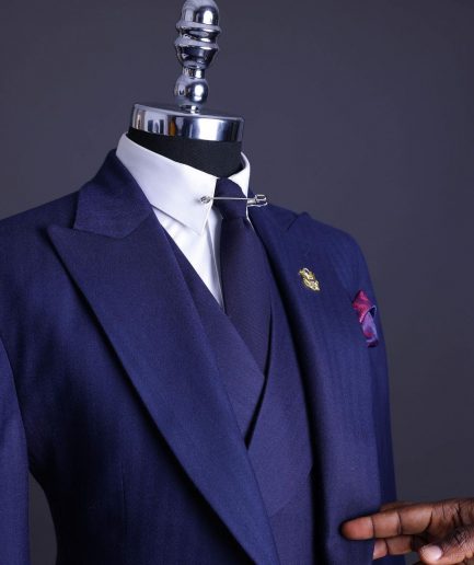 A Navy Blue, Herringbone Nobility Super “140s” “Board Room” Peak Lapel Suit