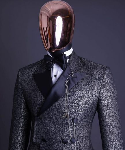 A “pirate” metallic jacquard, layered double breasted, 10 buttons, peak lapel tuxedo suit