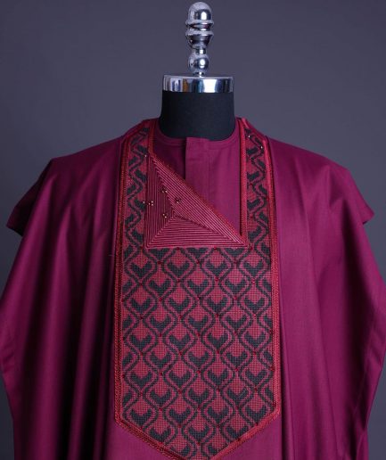 A Garnet red, redundant flame embroidery detailing agbada