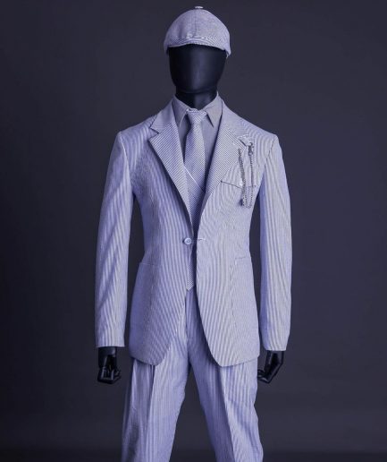 A monochrome seersucker (rail road stripe) notch lapel suit