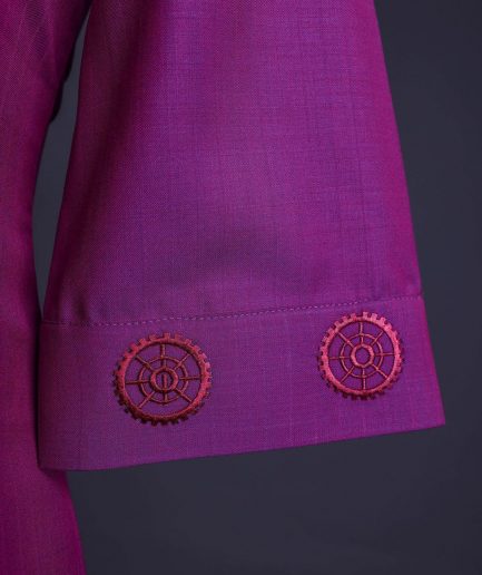 A Magenta, herringbone fabric, and interconnected ring embroidery details African senator kaftan native