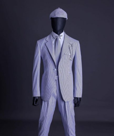 A monochrome seersucker (rail road stripe) notch lapel suit