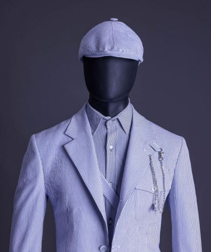 A monochrome seersucker (rail road stripe) notch lapel suit