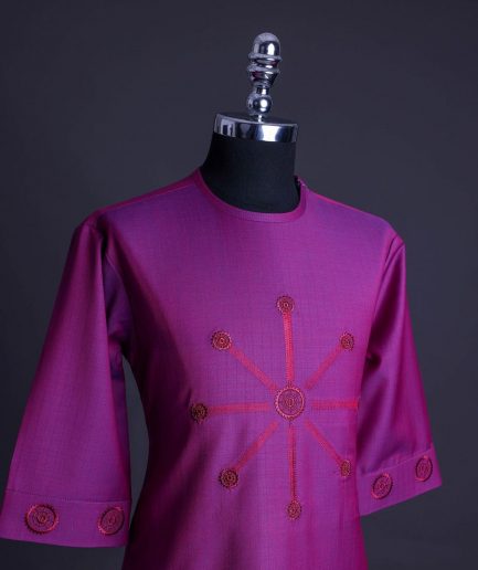 A Magenta, herringbone fabric, and interconnected ring embroidery details African senator kaftan native