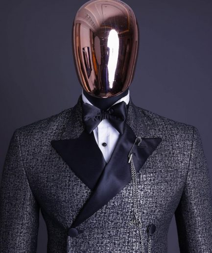 A “pirate” metallic jacquard, layered double breasted, 10 buttons, peak lapel tuxedo suit