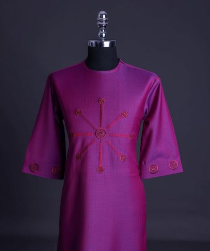 A Magenta, herringbone fabric, and interconnected ring embroidery details African senator kaftan native