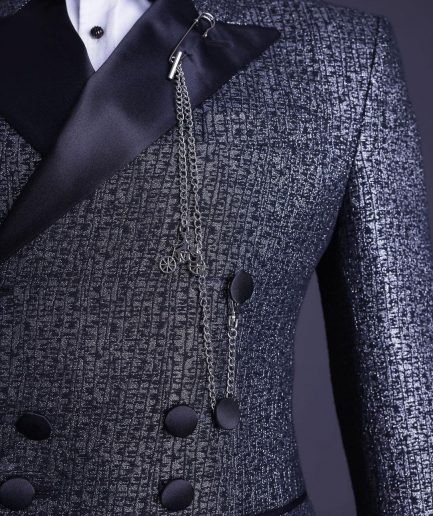 A “pirate” metallic jacquard, layered double breasted, 10 buttons, peak lapel tuxedo suit